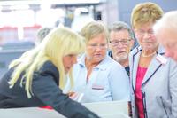 Fotodienstleister empfängt 170 ehemalige Mitarbeiter mit Begleitung
