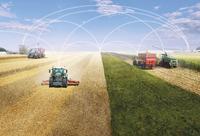 Freundlicher Datenkrake zeigt Farming 4.0
