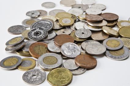 Wo werde ich Münzen aus dem Ausland los? / Zum Beispiel bei der ReiseBank. Die Bargeld-Experten kaufen den kleinen Münzschatz ausgewählter Länder an. (FOTO)