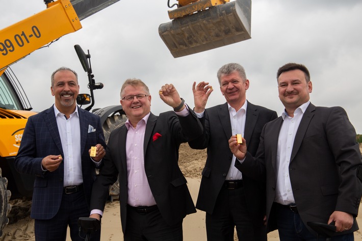 Wertvollster Sandberg der Welt im Münchner Olympiapark / Innovatives Cashback-System „wee“ startet europäische Metropolenstrategie (FOTO)